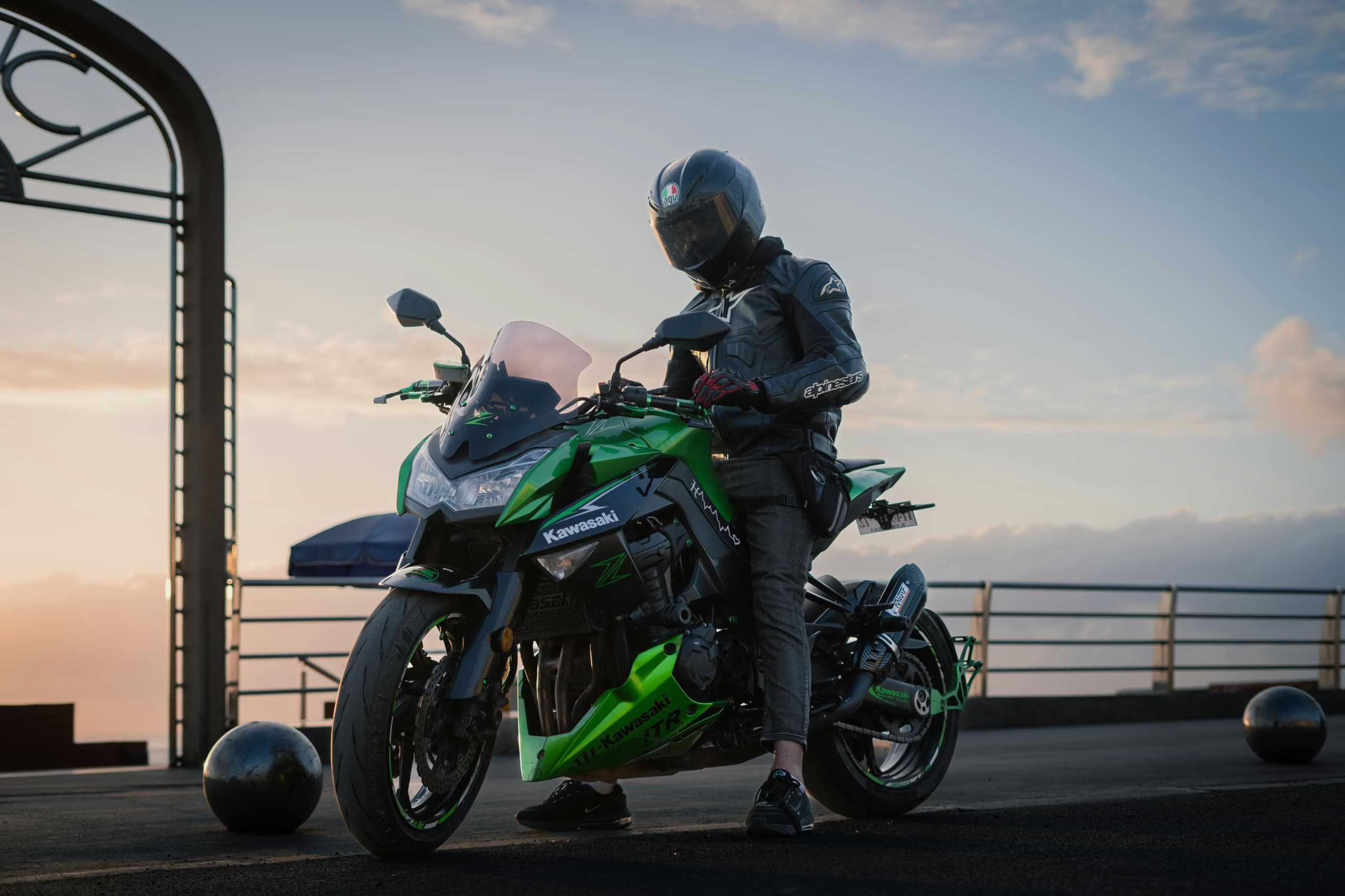 Motorcycle rider on kawasaki z1000 at sunset
